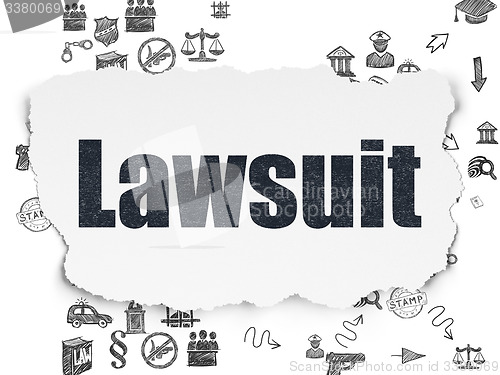 Image of Law concept: Lawsuit on Torn Paper background