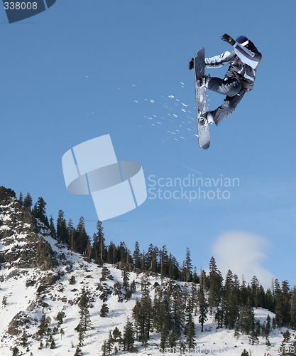 Image of Snowboarder jumping