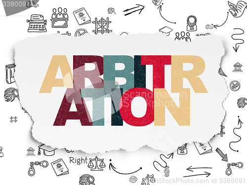 Image of Law concept: Arbitration on Torn Paper background