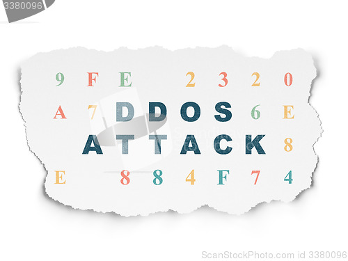 Image of Protection concept: DDOS Attack on Torn Paper background