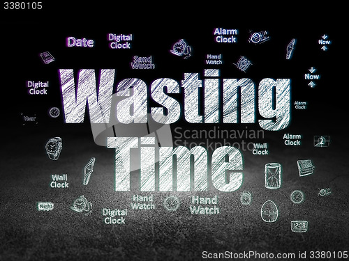 Image of Time concept: Wasting Time in grunge dark room