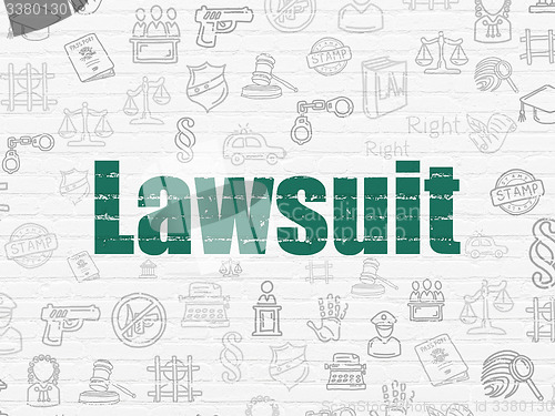 Image of Law concept: Lawsuit on wall background