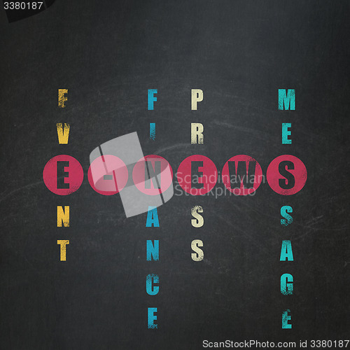 Image of News concept: word E-news in solving Crossword Puzzle