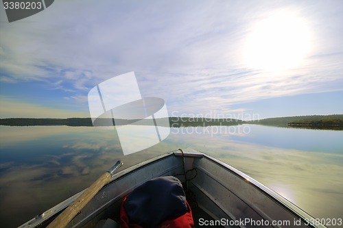 Image of boat trip in the evening sun lake