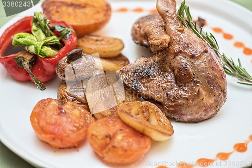 Image of grilled duck legs