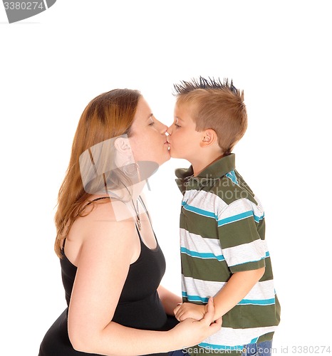 Image of Mother kissing her little boy.
