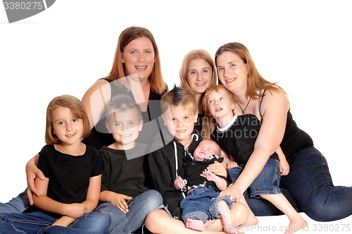 Image of A family of eight people together.