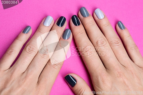 Image of Delicate female hands with a stylish neutral manicure