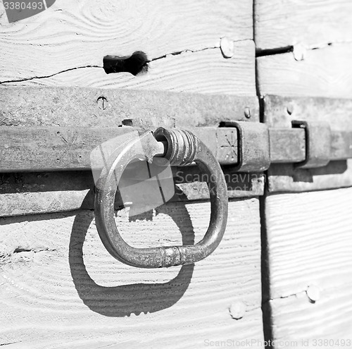 Image of europe old in  italy  antique close brown door and rusty lock  c