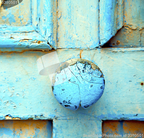 Image of morocco in africa the old wood  facade home and rusty safe padlo