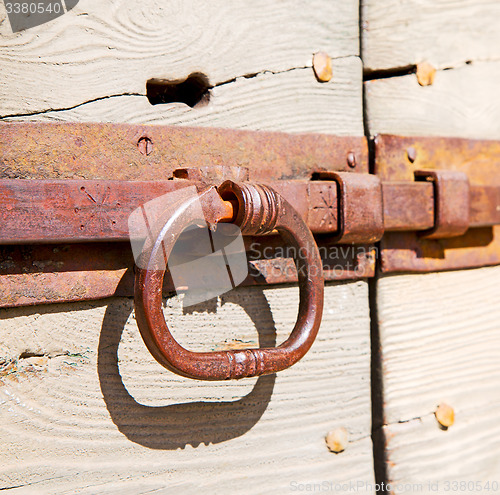 Image of europe old in  italy  antique close brown door and rusty lock  c