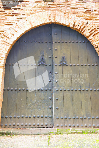 Image of historical in  antique  door morocco s  wood and metal rusty