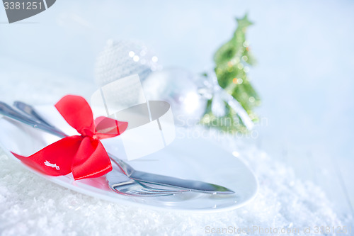 Image of fork and knife on white plate