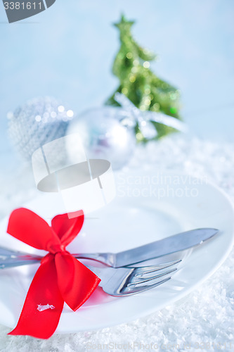 Image of fork and knife on white plate