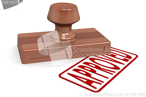 Image of Wooden stamp approved with red text