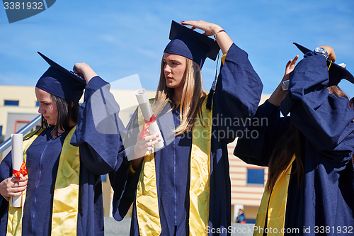 Image of young graduates students group