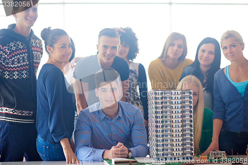 Image of group of students with teacher on class