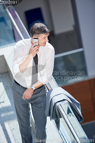 Image of business man using phone