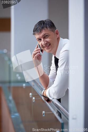 Image of business man using phone