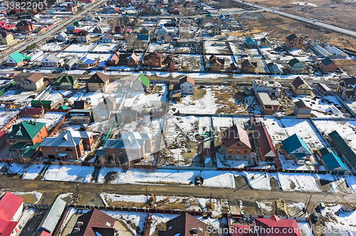 Image of Aerial view on suburban street at spring