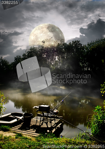 Image of Full moon over river