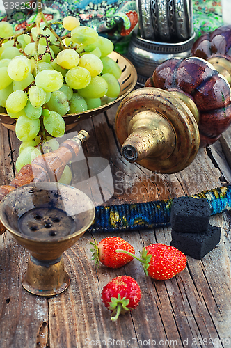 Image of Hookah on  wooden table