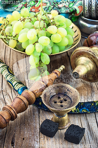 Image of Hookah on  wooden table