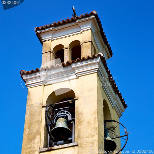 Image of ancien clock tower in italy europe old  stone and bell