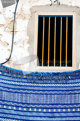 Image of blue window in morocco africa   carpet