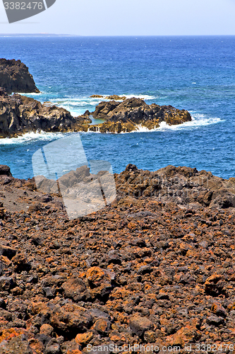 Image of hervideros brown rock in    stone water  and summer 