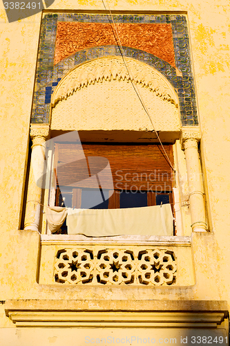 Image of   yellow  in morocco africa  and brown wall  