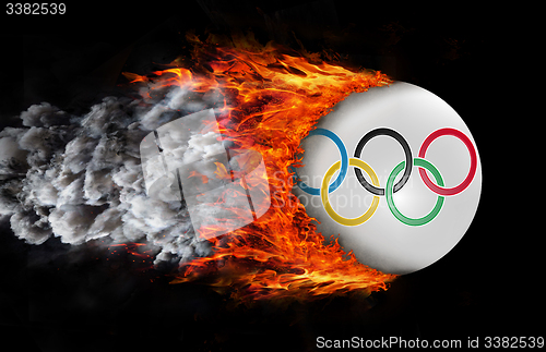 Image of Flag with a trail of fire and smoke - Olympic rings