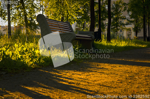 Image of Park bench at sunset