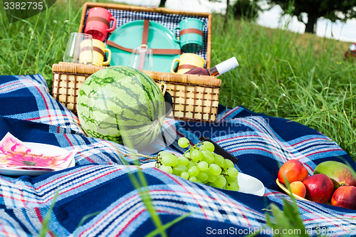 Image of Picnic blanket and basket 