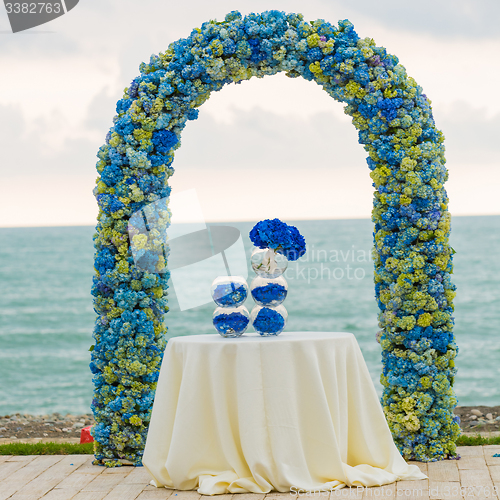 Image of beach wedding arch