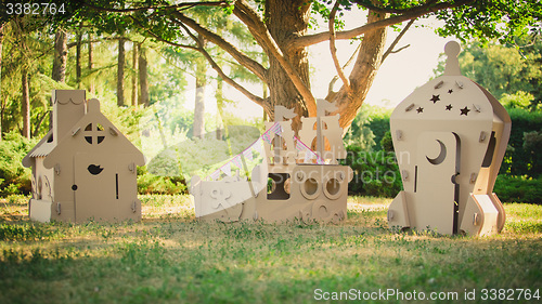 Image of Eco-friendly toys made of cardboard ship, house and  spaceship.