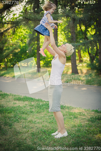 Image of Mother with baby at outdoor