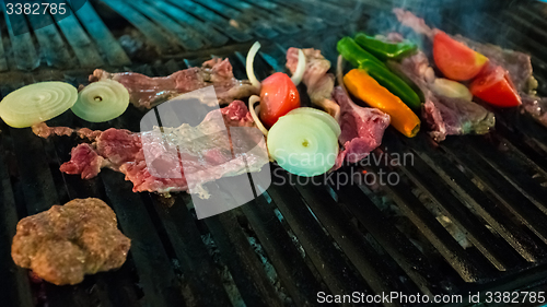 Image of Meat and vegetables char-grilled