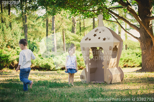 Image of Two kids are playing in park