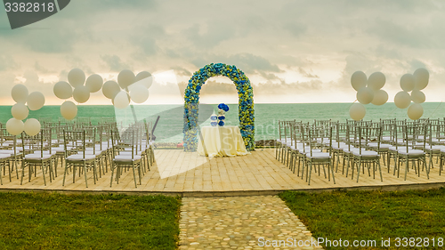 Image of beach wedding arch