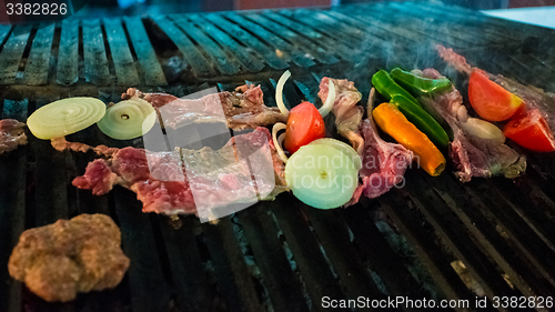 Image of Meat and vegetables char-grilled