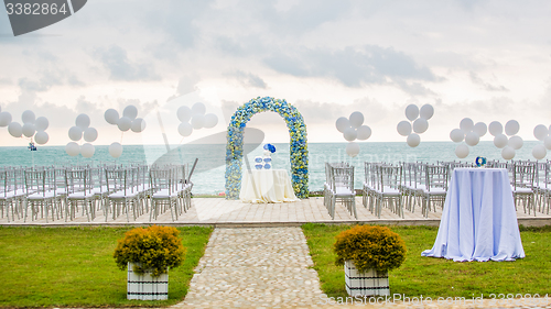 Image of beach wedding arch