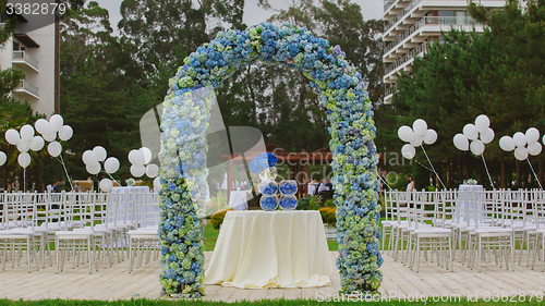 Image of beach wedding arch