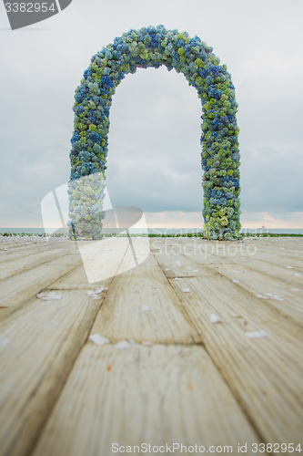 Image of beach wedding arch