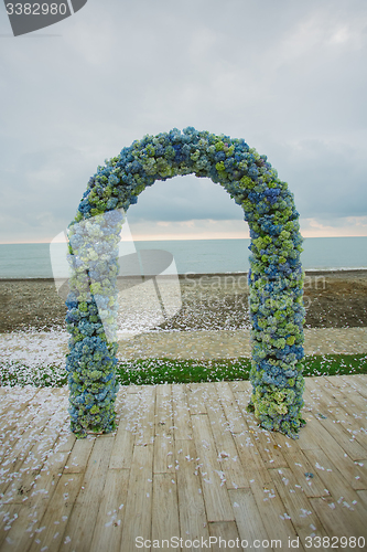 Image of beach wedding arch