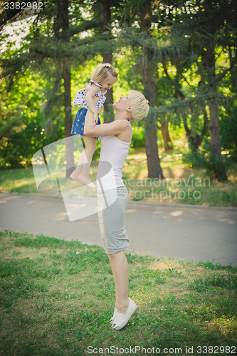 Image of Mother with baby at outdoor