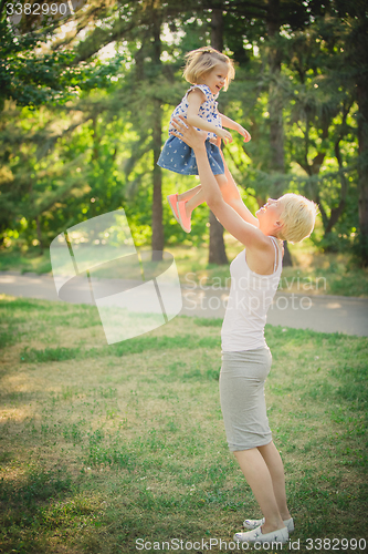 Image of Mother with baby at outdoor
