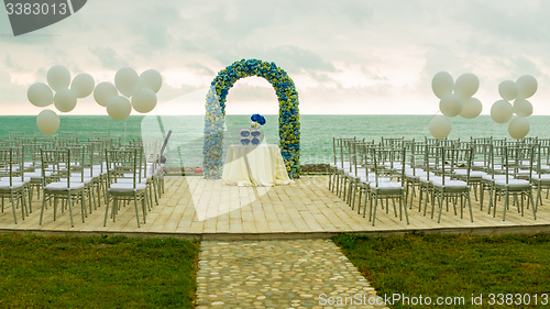 Image of beach wedding arch