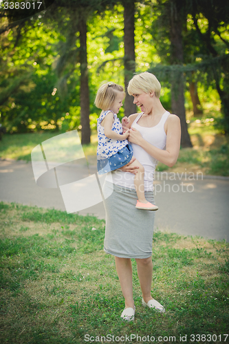 Image of Mother with baby at outdoor