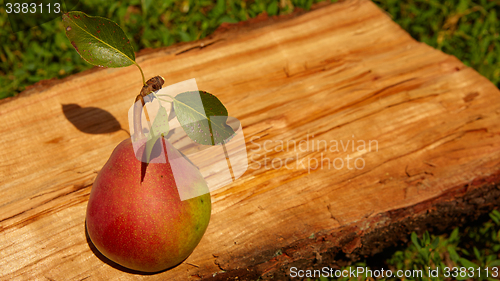 Image of Fresh organic pear on old wood. 